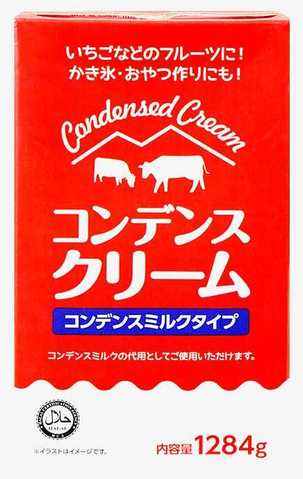 Red carton of Japanese condensed cream with cow illustrations and 1284g weight label
