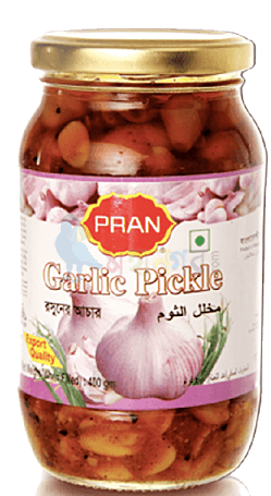Jar of Pran Garlic Pickle with visible garlic cloves and a gold lid