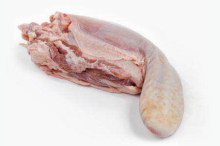 Raw beef tongue with visible muscle texture on a white background