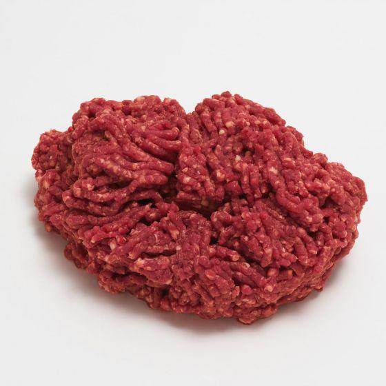 Fresh raw ground beef with a vibrant red color on a white background